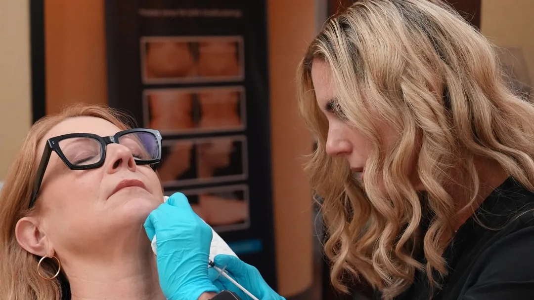 Megan Sosnick, RN, placing an injectable along the neck and jawline at Reviv Med Spa in Millbrae, California