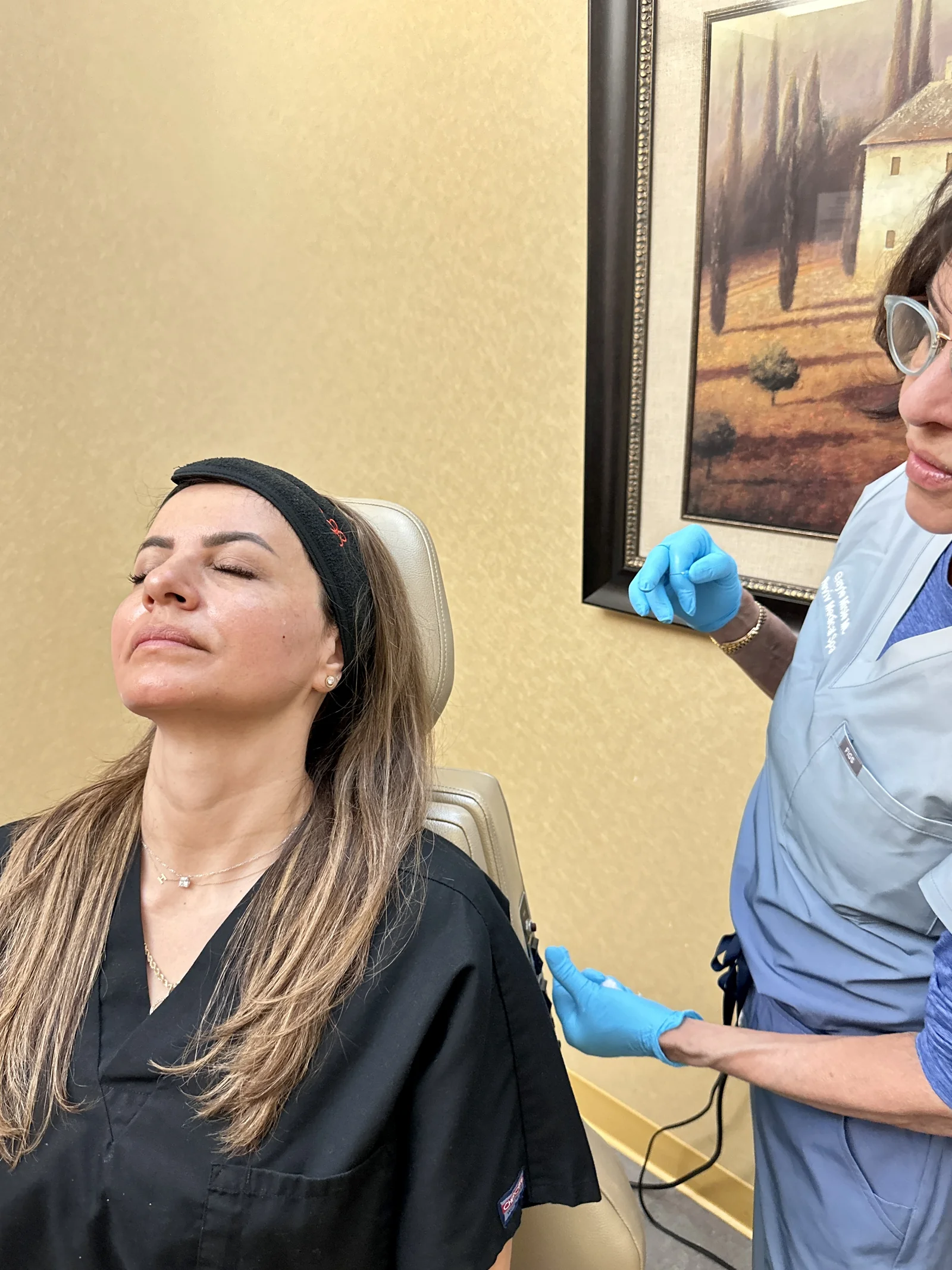 Reviv Med Spa patient with serene post-treatment skin glow